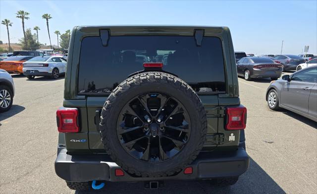 used 2022 Jeep Wrangler Unlimited 4xe car, priced at $33,478