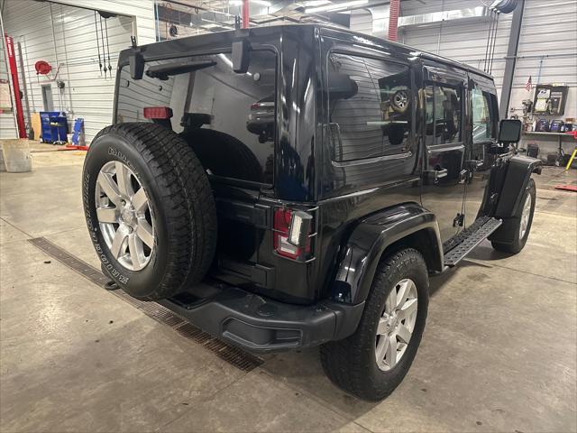 used 2018 Jeep Wrangler JK Unlimited car, priced at $26,823