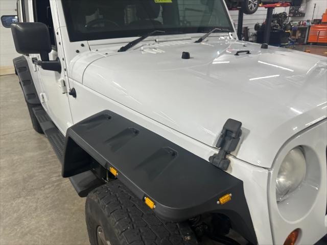 used 2013 Jeep Wrangler Unlimited car, priced at $17,814