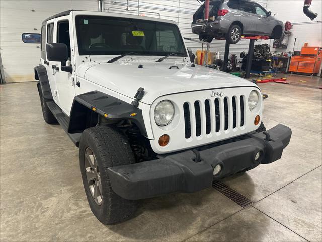 used 2013 Jeep Wrangler Unlimited car, priced at $17,814