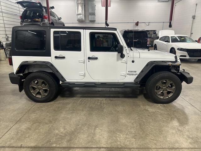 used 2013 Jeep Wrangler Unlimited car, priced at $17,814