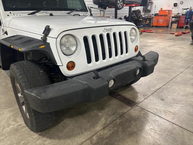 used 2013 Jeep Wrangler Unlimited car, priced at $17,814