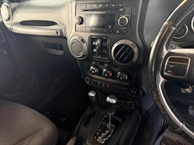used 2014 Jeep Wrangler Unlimited car, priced at $19,221