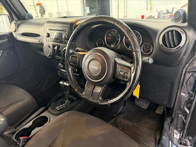used 2014 Jeep Wrangler Unlimited car, priced at $19,221