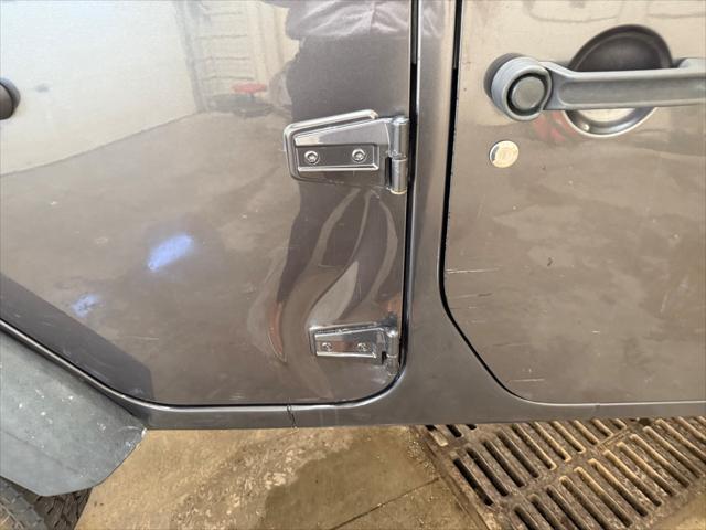 used 2014 Jeep Wrangler Unlimited car, priced at $19,221