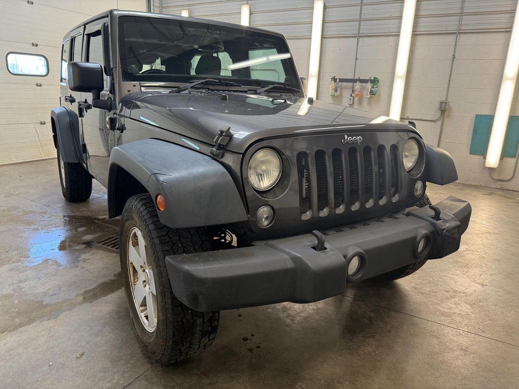 used 2014 Jeep Wrangler Unlimited car, priced at $18,486