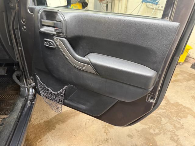 used 2014 Jeep Wrangler Unlimited car, priced at $19,221