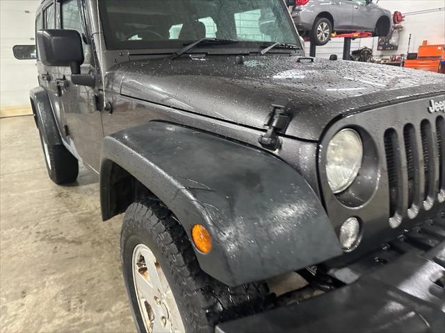 used 2014 Jeep Wrangler Unlimited car, priced at $19,378