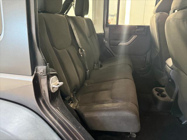 used 2014 Jeep Wrangler Unlimited car, priced at $19,221