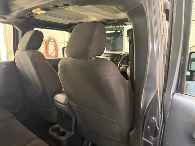 used 2014 Jeep Wrangler Unlimited car, priced at $19,221