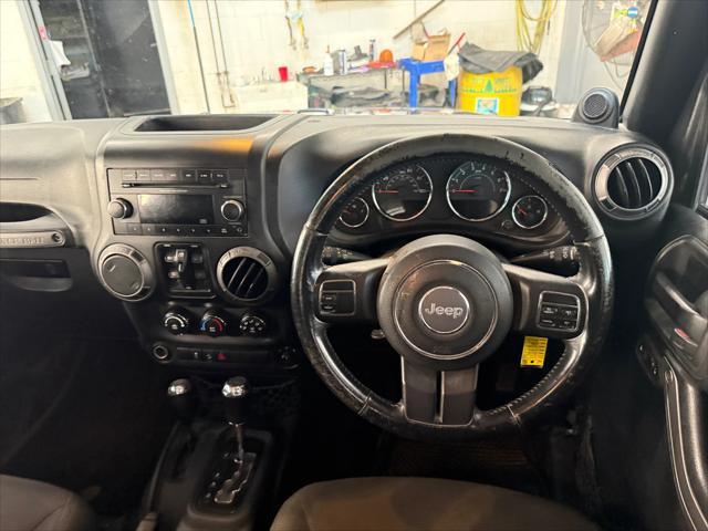 used 2014 Jeep Wrangler Unlimited car, priced at $19,221