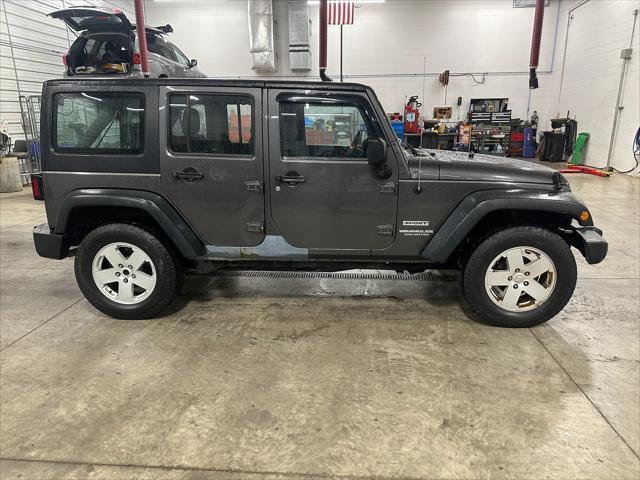 used 2014 Jeep Wrangler Unlimited car, priced at $19,378