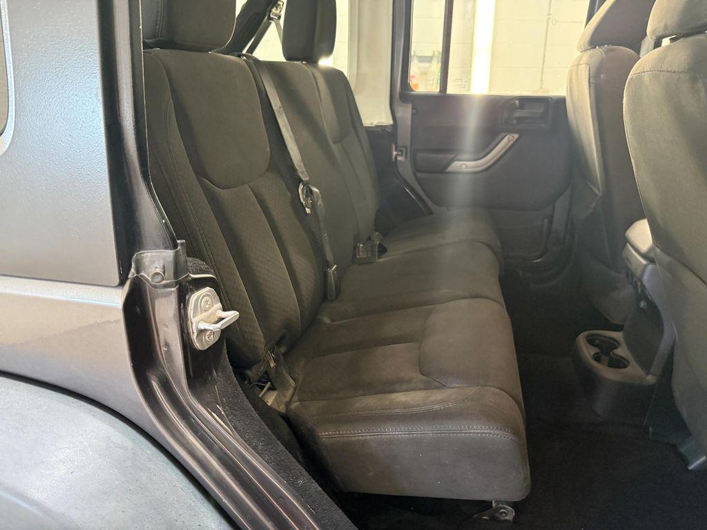 used 2014 Jeep Wrangler Unlimited car, priced at $18,486