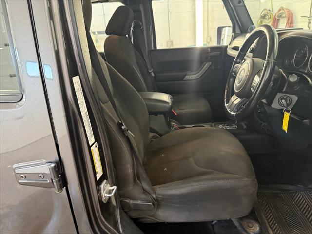 used 2014 Jeep Wrangler Unlimited car, priced at $19,221