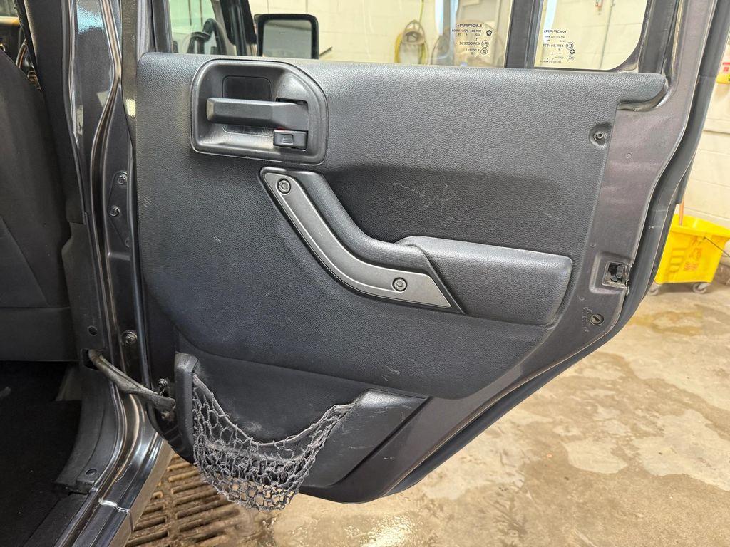 used 2014 Jeep Wrangler Unlimited car, priced at $18,486