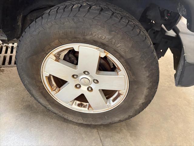 used 2014 Jeep Wrangler Unlimited car, priced at $19,221