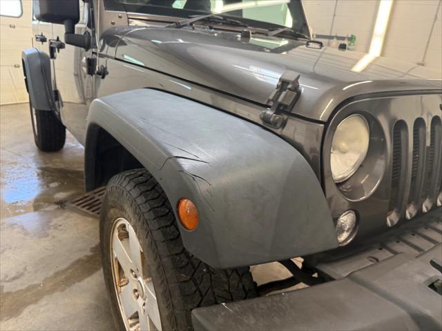 used 2014 Jeep Wrangler Unlimited car, priced at $19,221