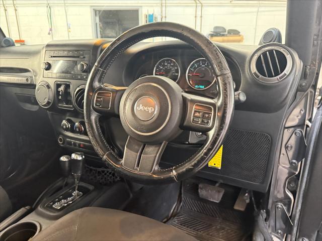 used 2014 Jeep Wrangler Unlimited car, priced at $19,221