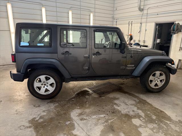 used 2014 Jeep Wrangler Unlimited car, priced at $19,221