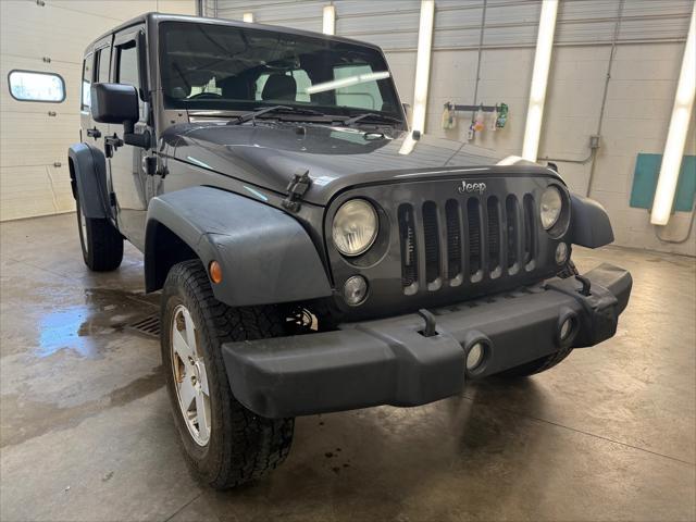 used 2014 Jeep Wrangler Unlimited car, priced at $19,221