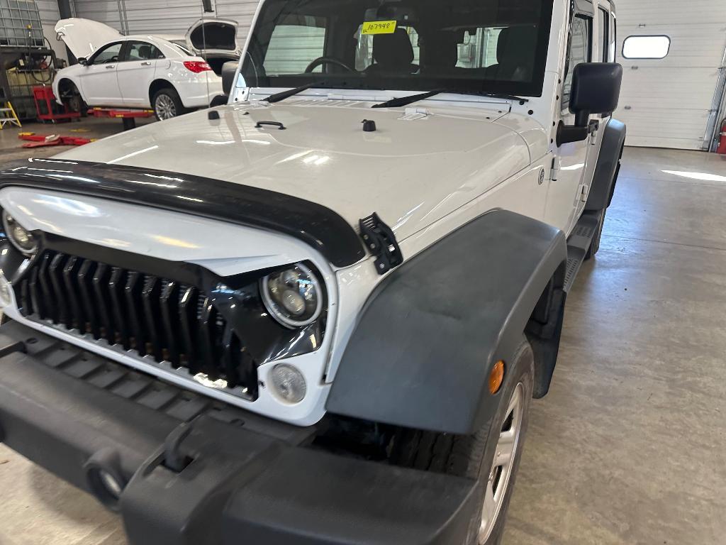 used 2014 Jeep Wrangler Unlimited car, priced at $20,864