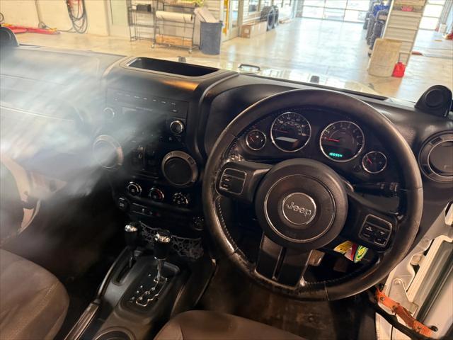 used 2013 Jeep Wrangler Unlimited car, priced at $17,278