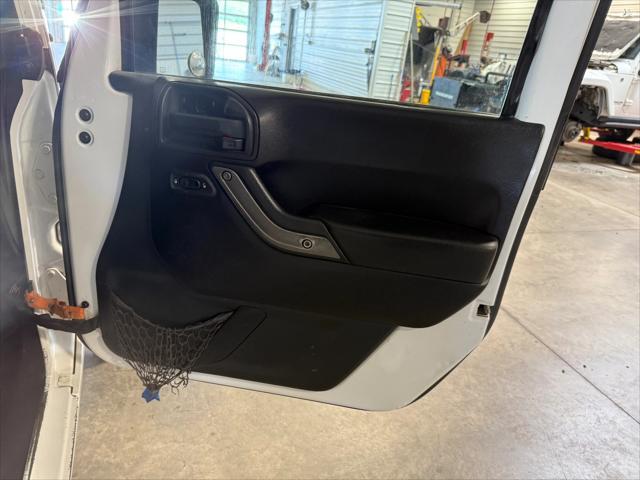 used 2013 Jeep Wrangler Unlimited car, priced at $17,278