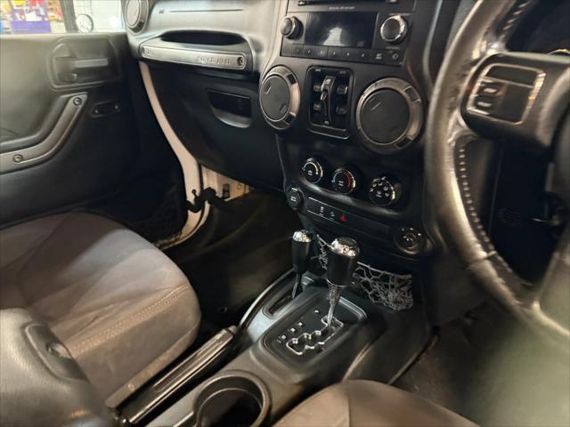 used 2013 Jeep Wrangler Unlimited car, priced at $17,278