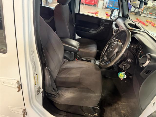 used 2013 Jeep Wrangler Unlimited car, priced at $17,278