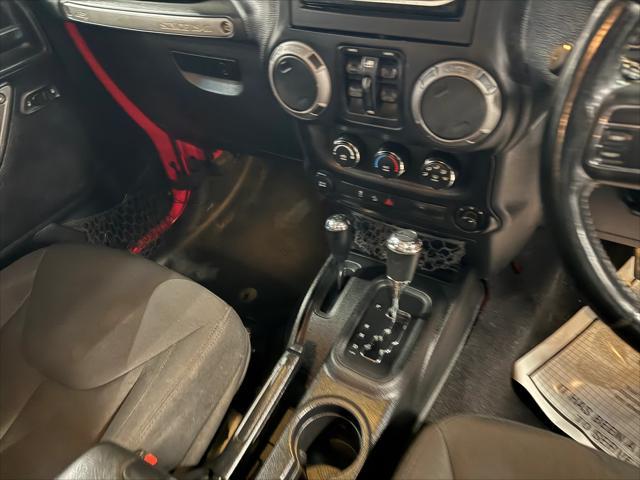 used 2015 Jeep Wrangler Unlimited car, priced at $20,913