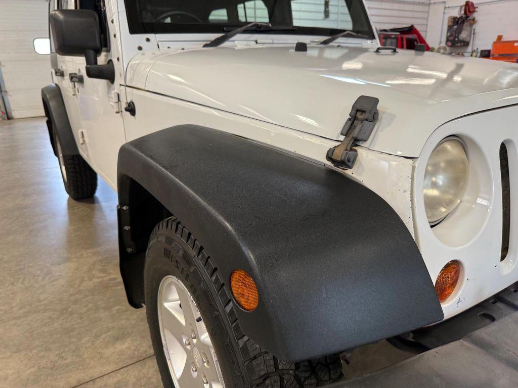 used 2011 Jeep Wrangler Unlimited car, priced at $12,912