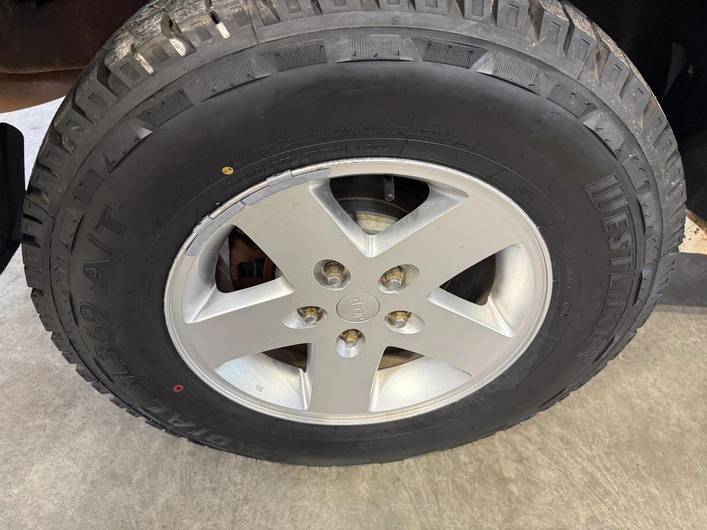 used 2011 Jeep Wrangler Unlimited car, priced at $12,912
