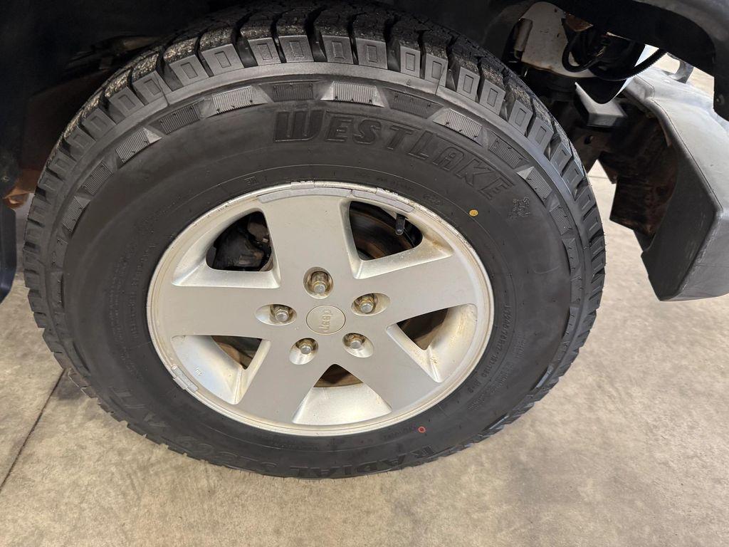 used 2011 Jeep Wrangler Unlimited car, priced at $12,912