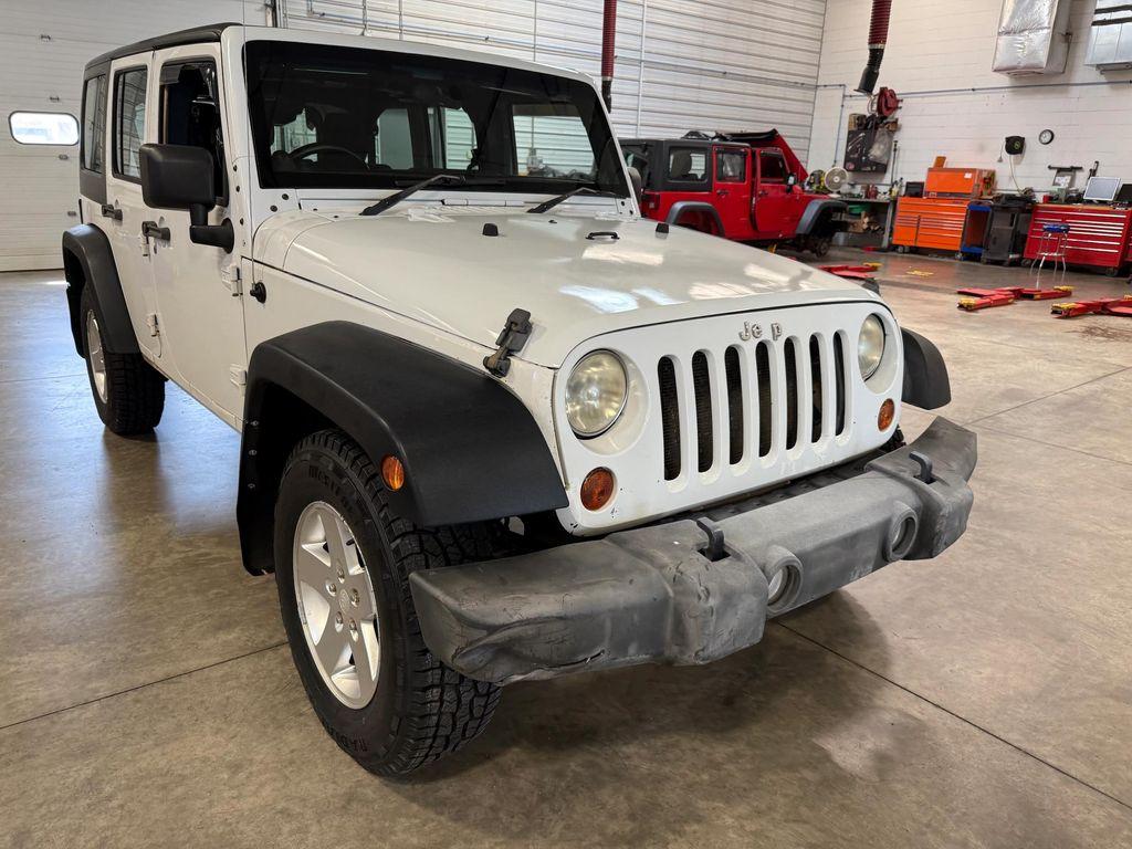 used 2011 Jeep Wrangler Unlimited car, priced at $12,912