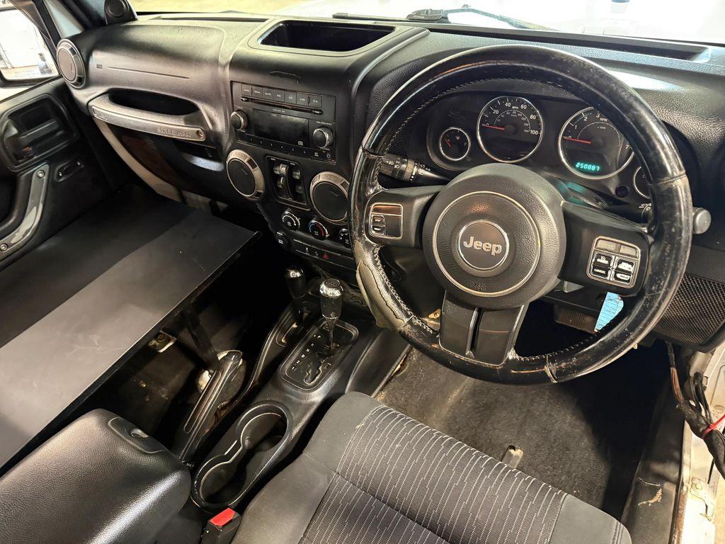 used 2011 Jeep Wrangler Unlimited car, priced at $12,912