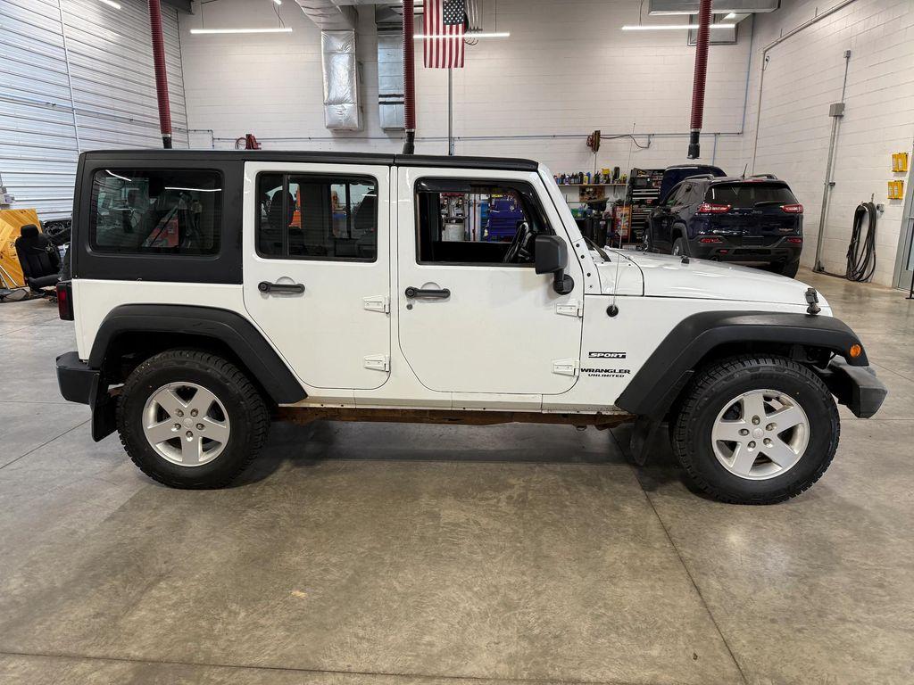 used 2011 Jeep Wrangler Unlimited car, priced at $12,912