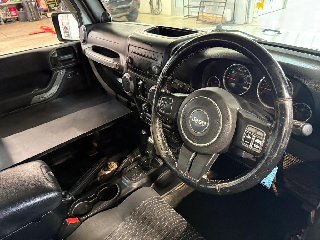 used 2011 Jeep Wrangler Unlimited car, priced at $12,912
