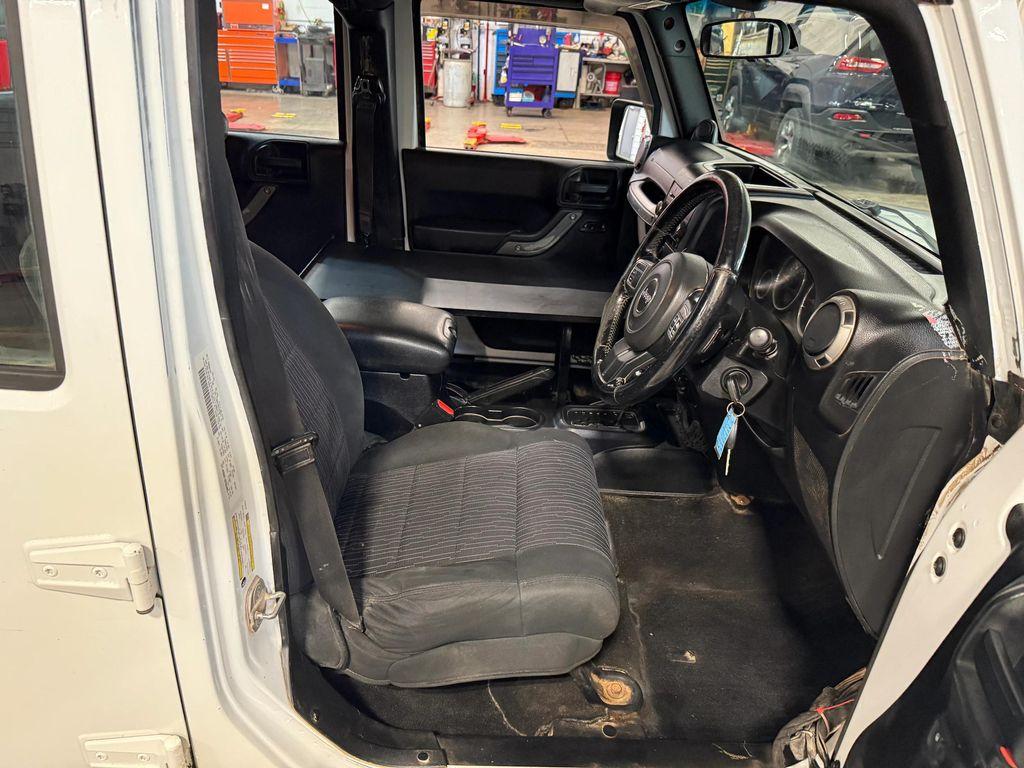 used 2011 Jeep Wrangler Unlimited car, priced at $12,912