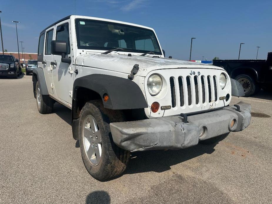 used 2011 Jeep Wrangler Unlimited car, priced at $14,318