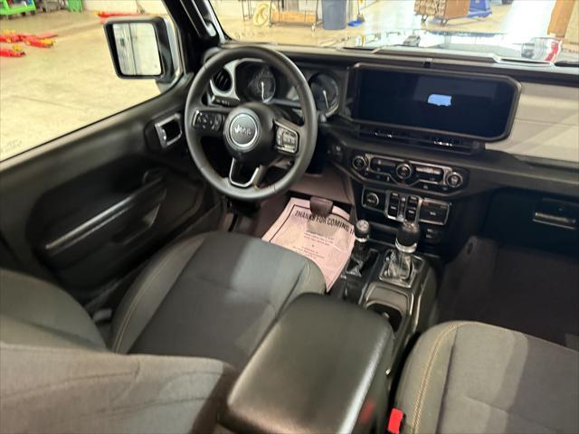 used 2024 Jeep Wrangler 4xe car, priced at $35,237
