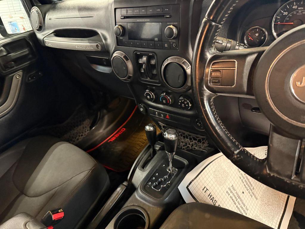 used 2016 Jeep Wrangler Unlimited car, priced at $18,592