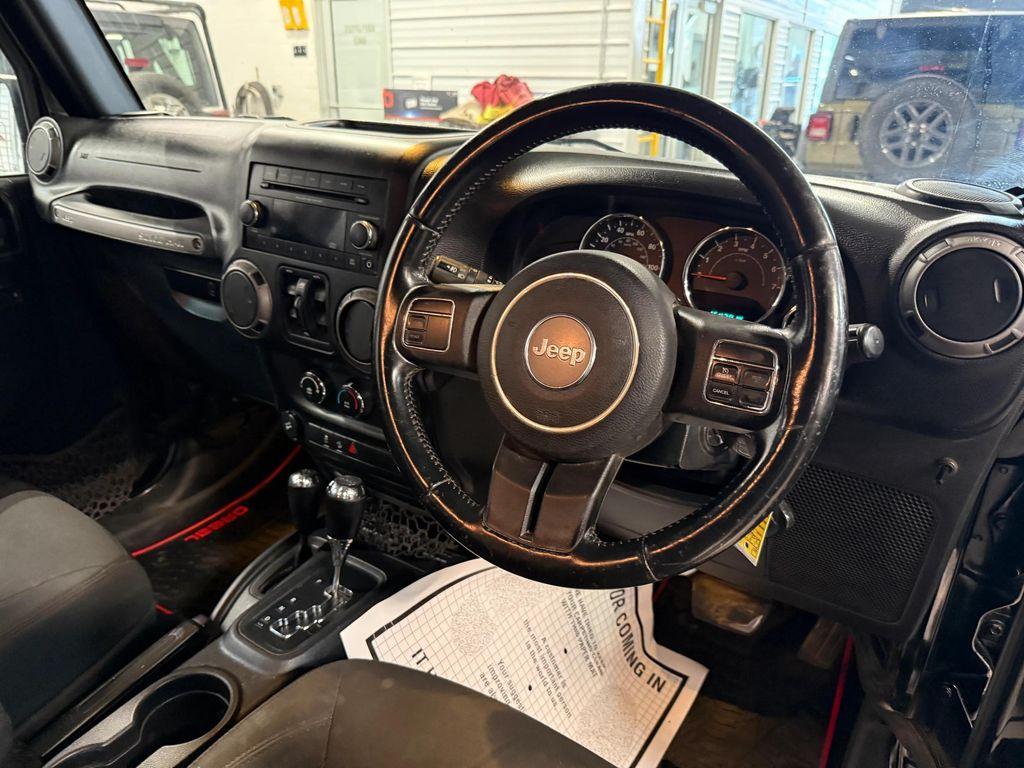 used 2016 Jeep Wrangler Unlimited car, priced at $18,592