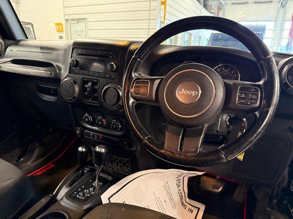 used 2016 Jeep Wrangler Unlimited car, priced at $18,592