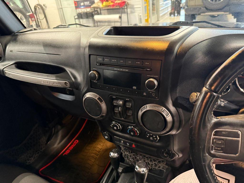 used 2016 Jeep Wrangler Unlimited car, priced at $18,592