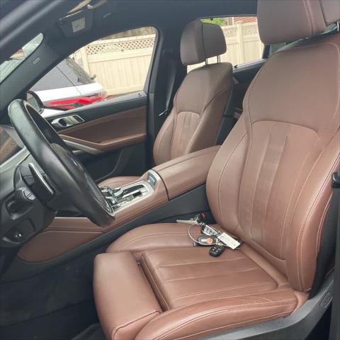 used 2022 BMW X6 car, priced at $52,902