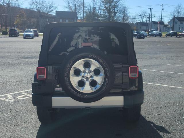 used 2015 Jeep Wrangler car, priced at $16,900