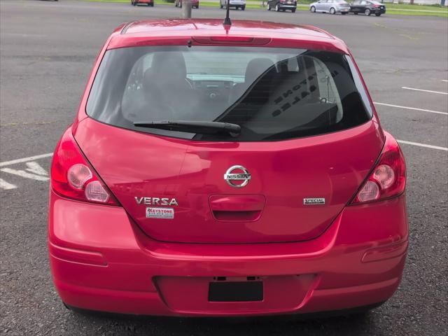 used 2012 Nissan Versa car, priced at $7,000