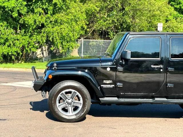 used 2014 Jeep Wrangler Unlimited car, priced at $17,395