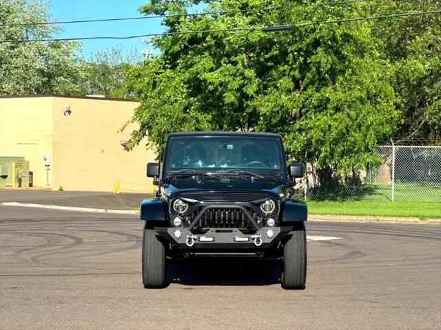 used 2014 Jeep Wrangler Unlimited car, priced at $17,395