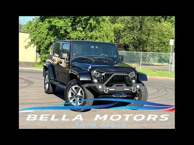 used 2014 Jeep Wrangler Unlimited car, priced at $17,395